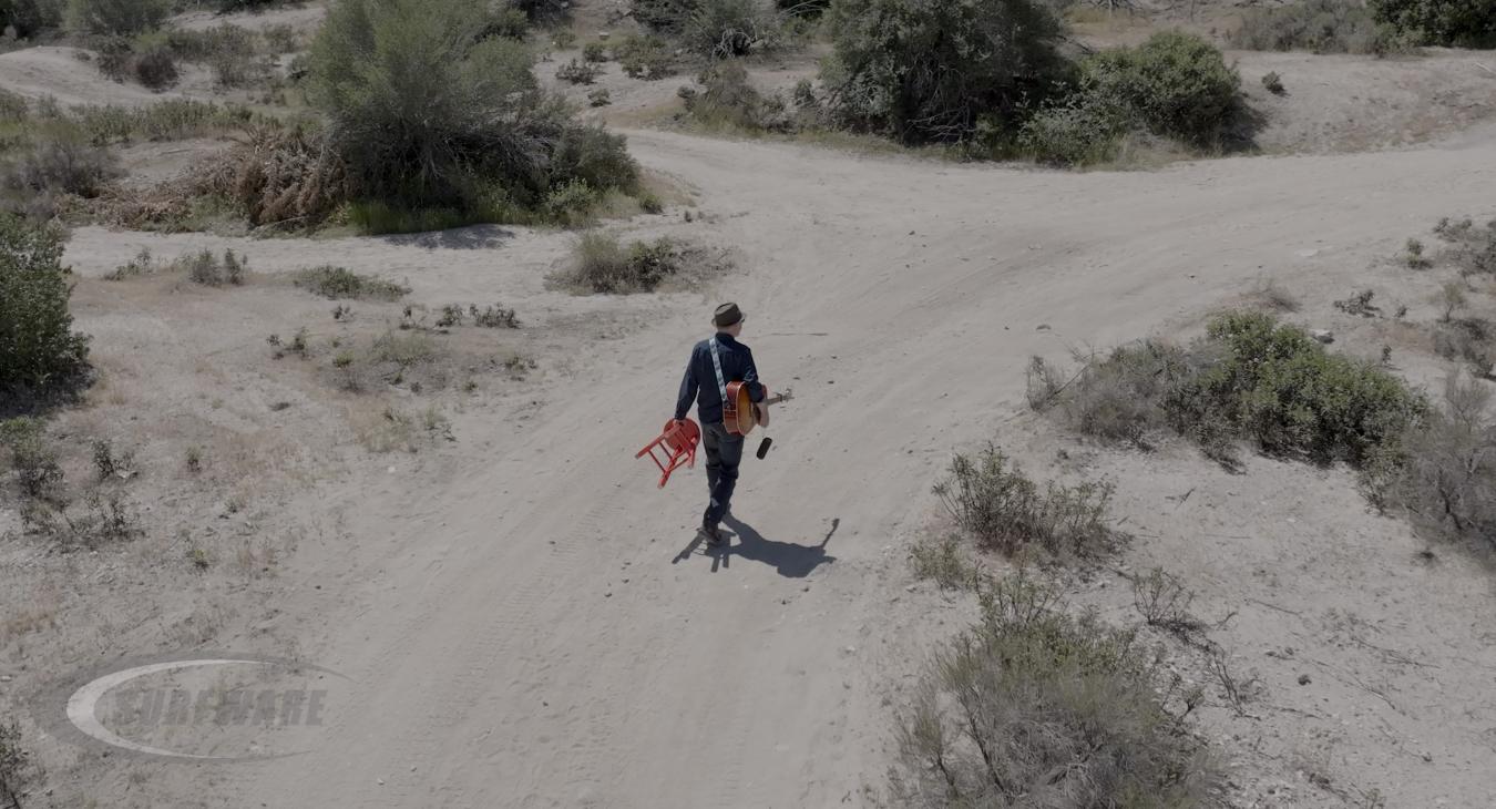 Man Guitar Desert