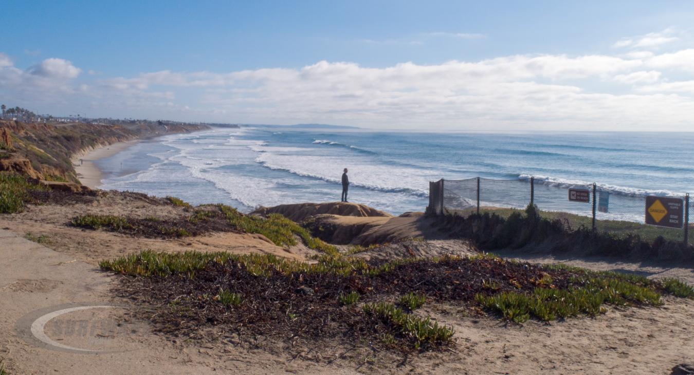Man On Ocean Cliff